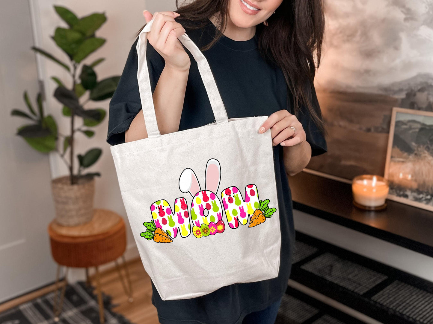 a woman holding a white bag with two bunny ears on it