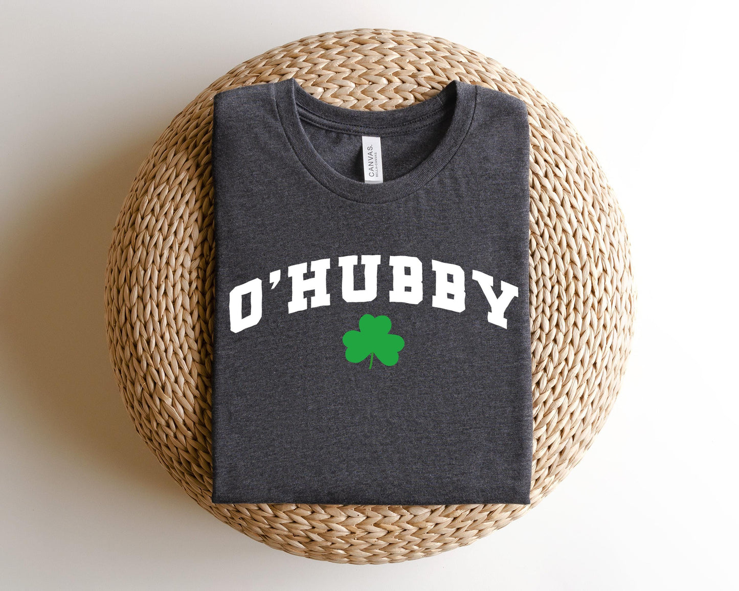 a t - shirt that says ohubby with a shamrock on it