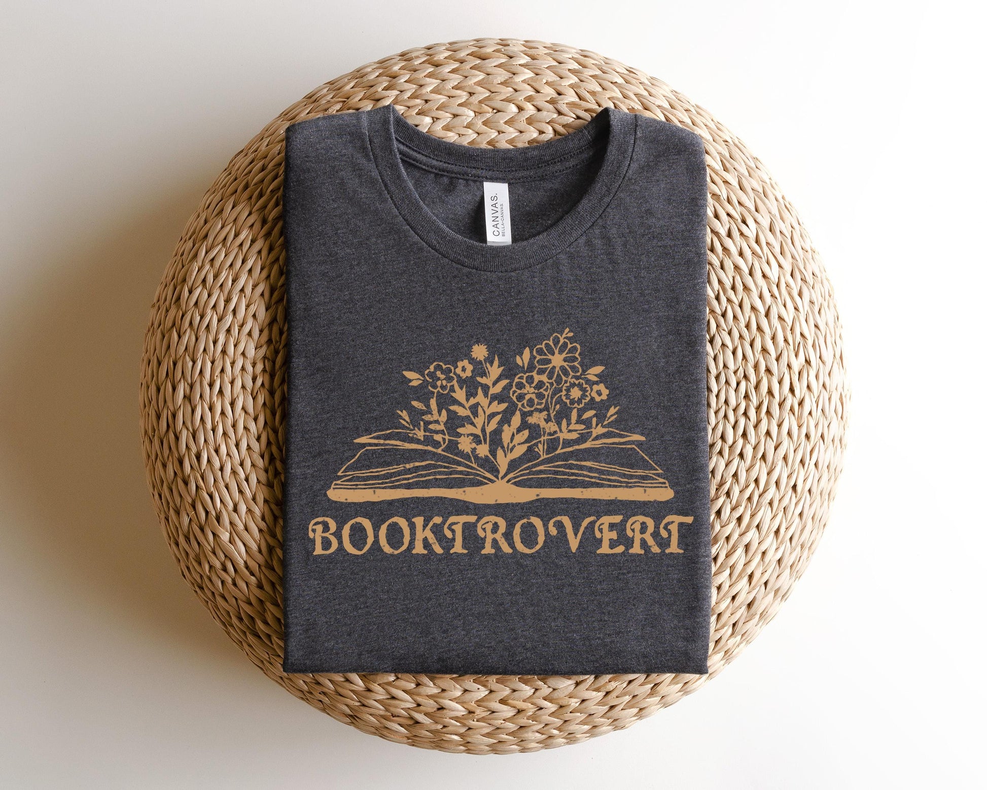 a t - shirt with a booktrovert logo on it