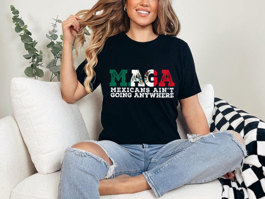 a woman sitting on a couch wearing a black shirt