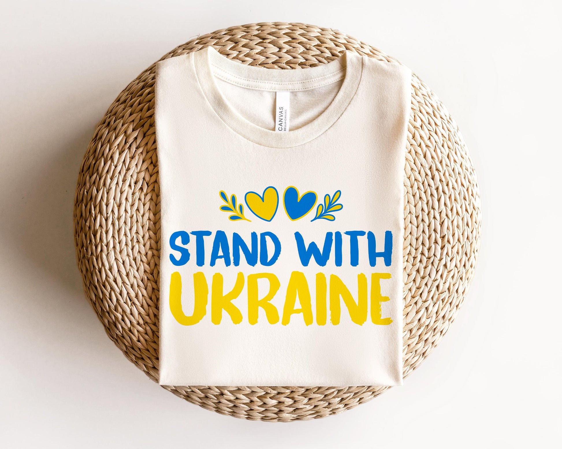 a t - shirt that says stand with ukraine on it