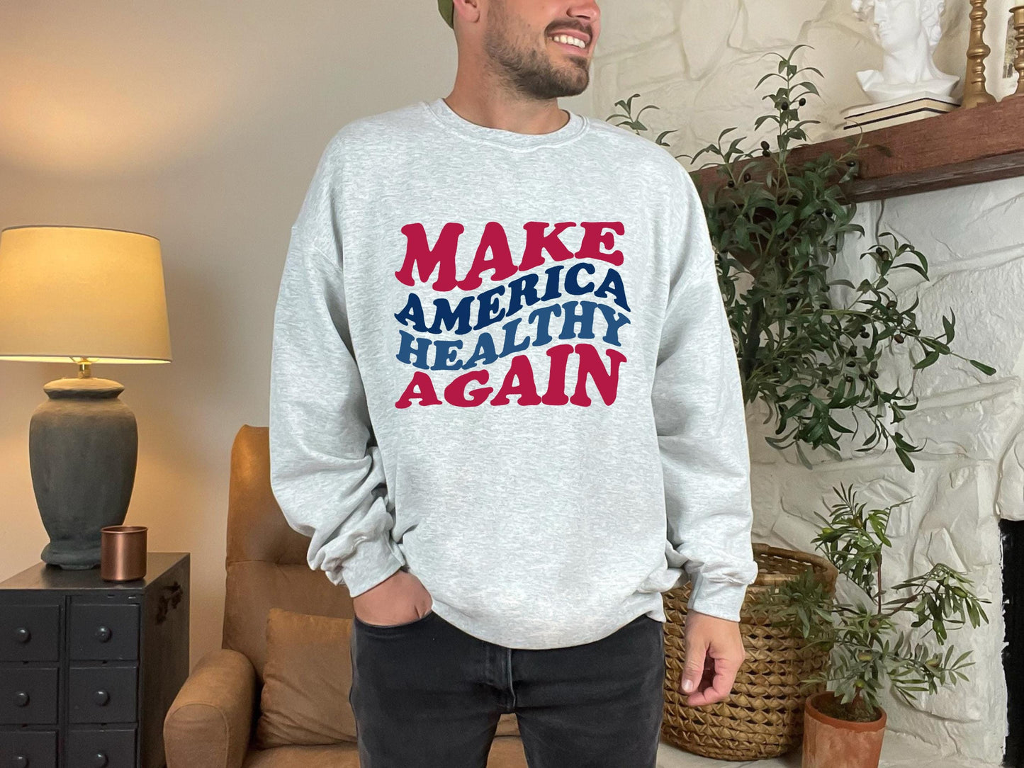 a man wearing a sweatshirt that says make america healthy again