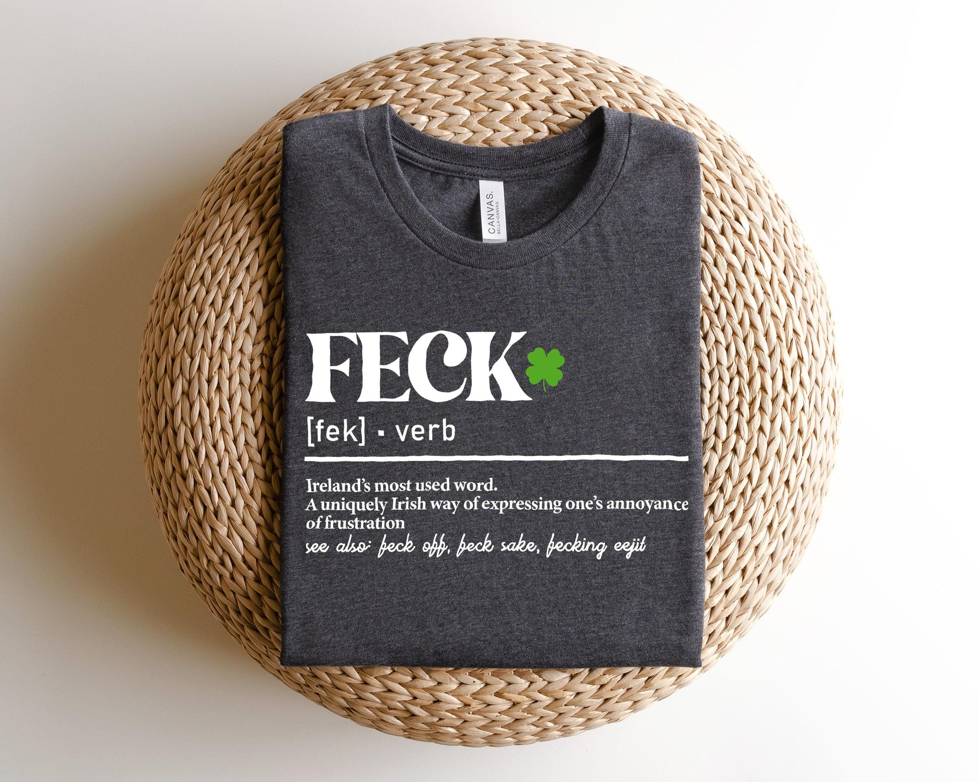 a t - shirt that reads feck on it