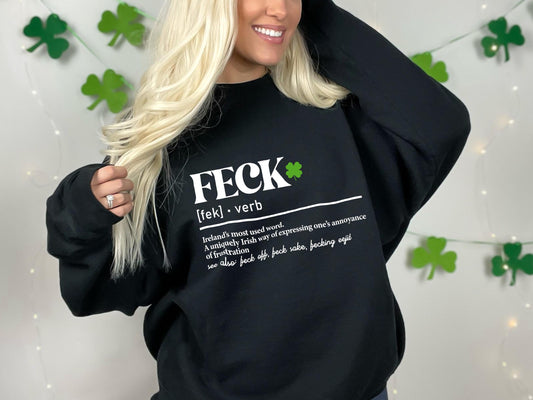 a woman with blonde hair wearing a black sweatshirt