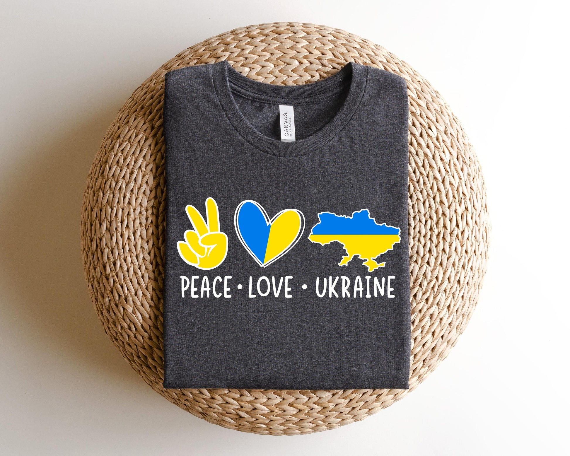a t - shirt that says peace love ukraine