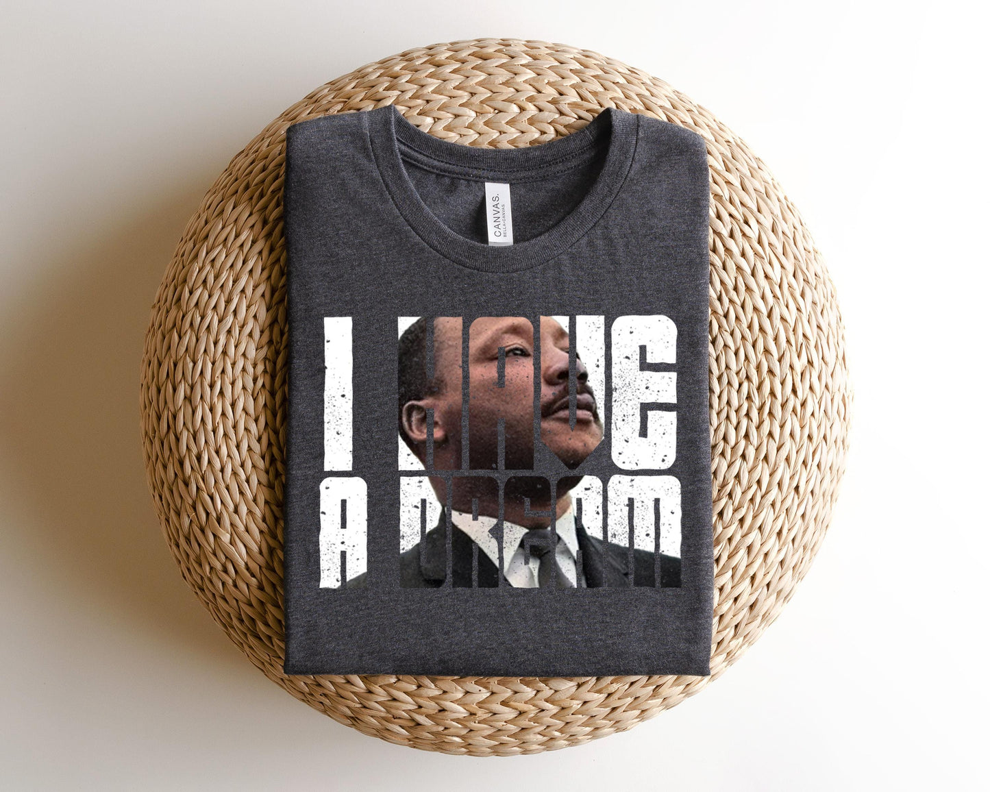 a t - shirt with a picture of a man behind bars