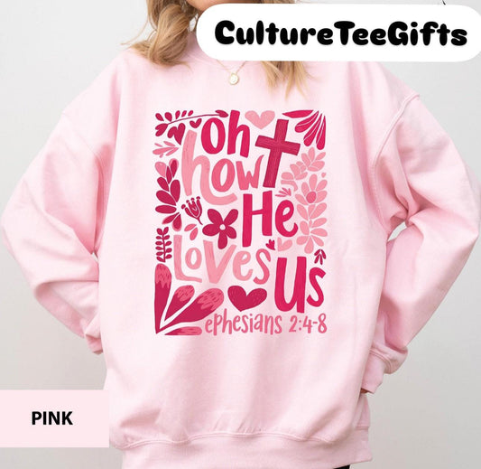 a girl wearing a pink sweatshirt with a bible verse on it