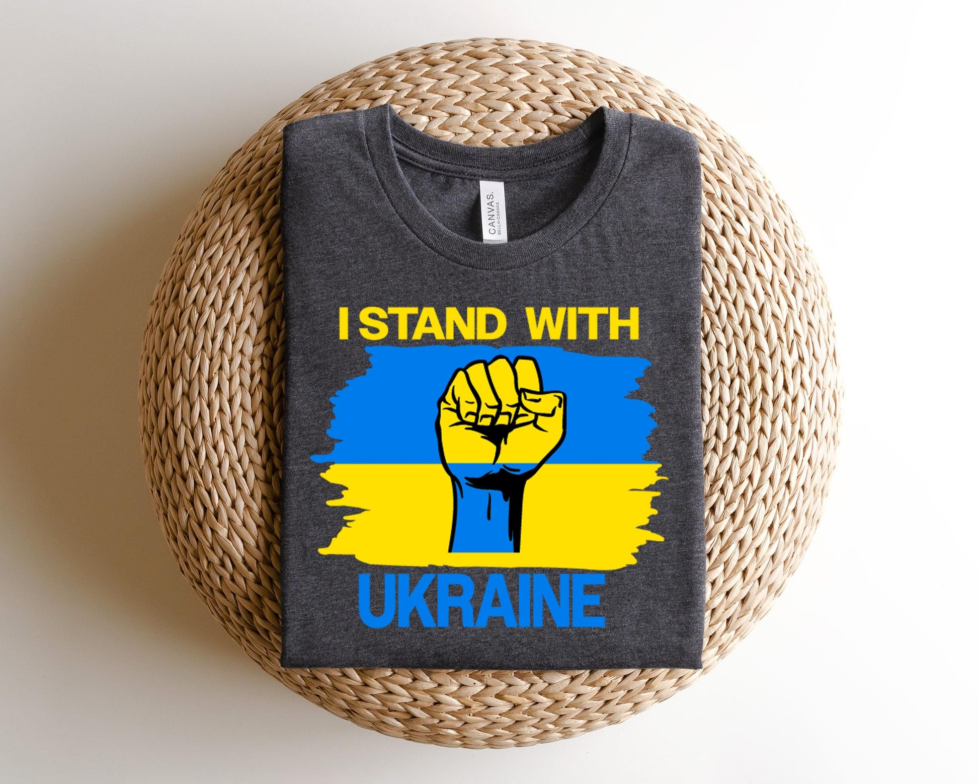 a t - shirt that says i stand with ukraine on it