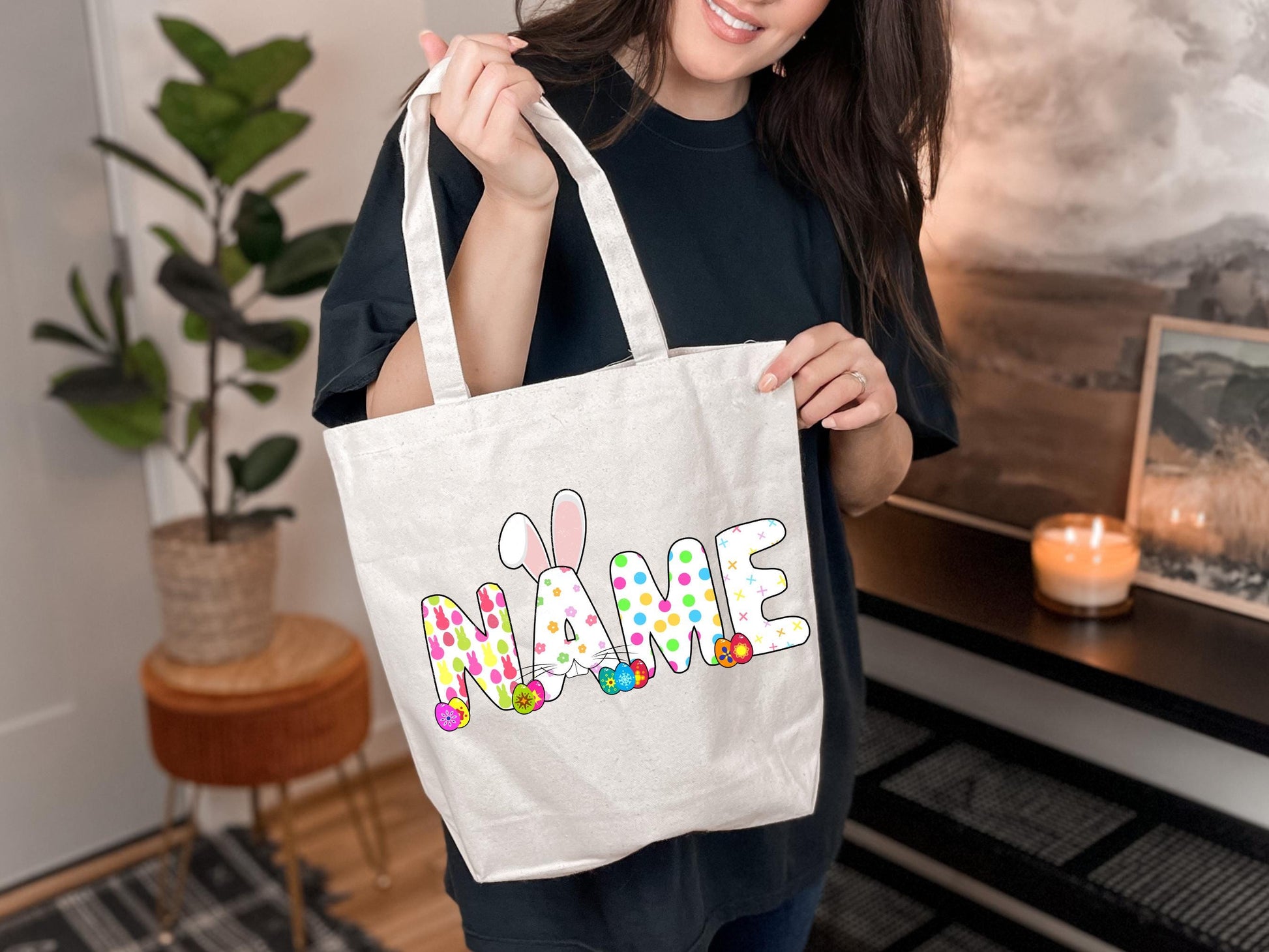 a woman holding a white bag with the word dance on it