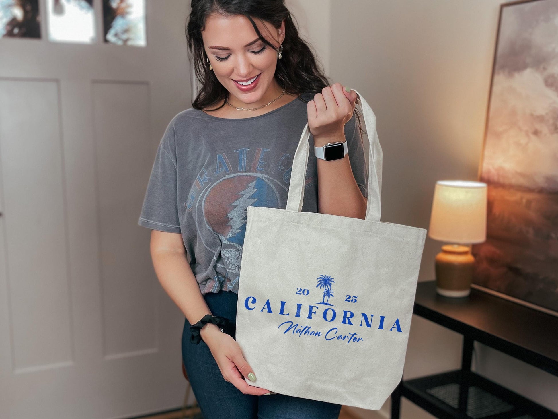 a woman holding a shopping bag in her hand