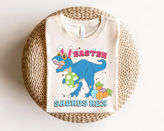 a white t - shirt with a dinosaur on it
